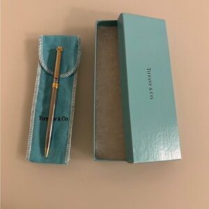 Tiffany & Co. T-clip ballpoint pen. Silver ruthenium & gold plating. Never used.
